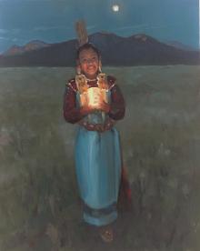 young native american girl holding a lantern at twilight